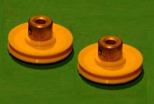Two Meccano plastic Pulleys