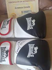  GENUINE "LENNOX LEWIS : HAND  SIGNED PAIR OF BOXING GLOVES WITH COA.