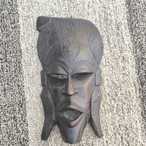 Hand carved wooden face - hand,
