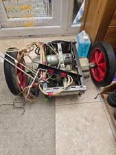 two used 12 - 24 volt electric wheelchair motors with gearboxes