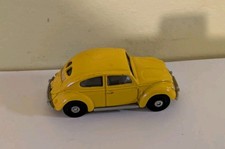 Yellow corgi Volkswagen beetle car