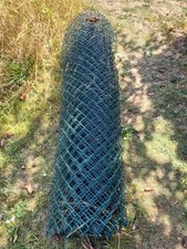 Green PVC-coated chain-link fencing.