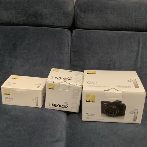 Nikon 10 30mm - 1, +