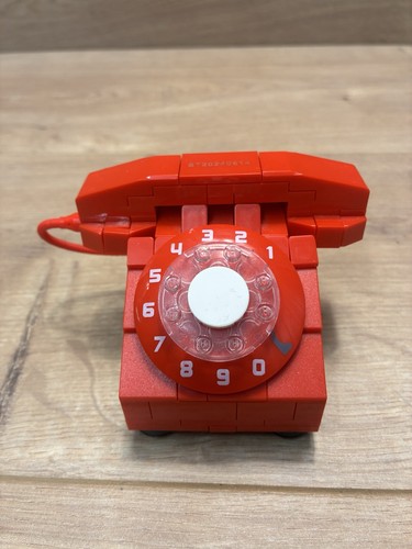 Red rotary telephone - red,