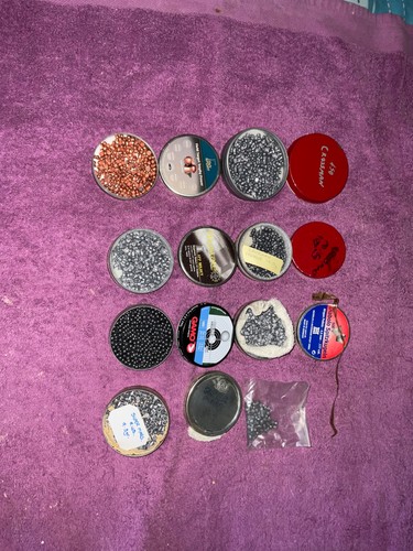 Open part used tins of - 7,
