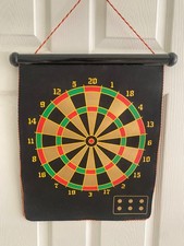 Magnetic indoor darts board with 12 darts