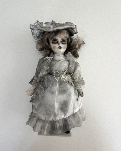 Haunted gothic porcelain doll - haunted,