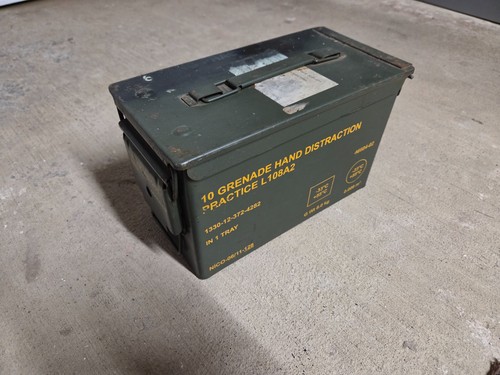 Empty military grenade tin - grenade,