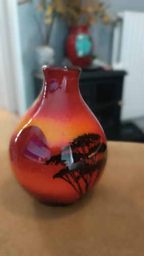 Poole pottery red african - pottery, sky