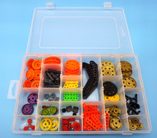 Plastic storage box containing a useful selection of Meccano small plastic parts