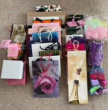 Large selection of assorted gift bags, wine bags, ribbons, shredded tissue paper