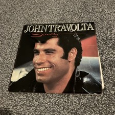 John Travolta – Sandy