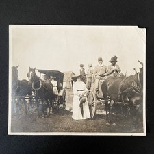 Families in Horse Drawn Wagons