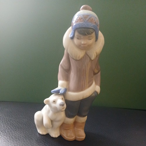 Lladro eskimo boy with pet - boy,