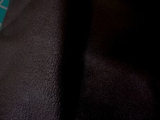 Very dark brown pigskin