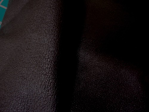 Very dark brown pigskin