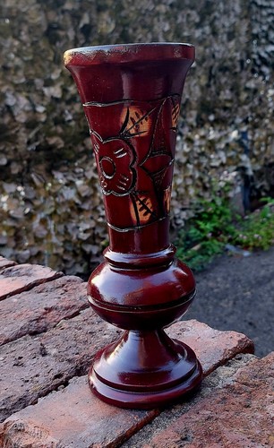Hand carved dark burgundy - carved,