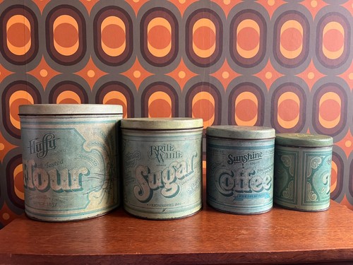 Four vintage ballonoff tin - four,
