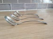 Four vintage small ladle sauce