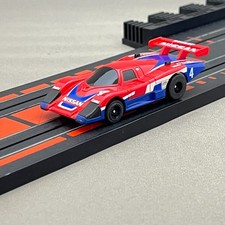AFX Nissan March 86G Nismo Red