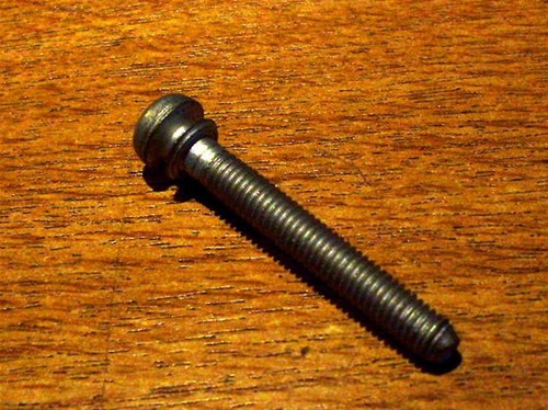 Headlamp adjuster bolt screw