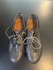 Nio Nio Stylish Black Platform Shoes with Fringe Details