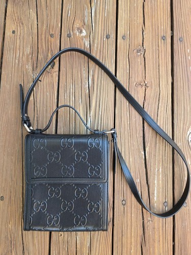Gucci black leather embossed - gucci,