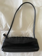 SUZY SMITH. Black Leather