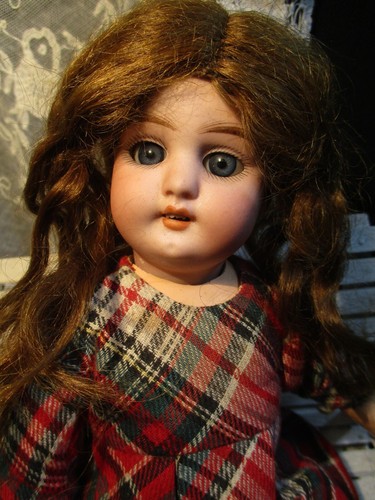 Antique porcelain head doll