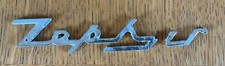 VINTAGE ORIGINAL ZEPHYR EMBLEM CAR BROKEN BUT COULD BE EASILY FIXED