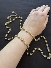 Unusual Link Gold Tone Clear