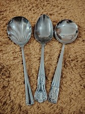 Three vintage serving spoons - three,