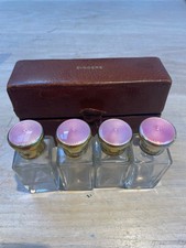 Beautiful Boxed set of Asprey gold plated on silver perfume bottles circa 1932