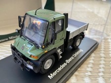 1:43 scale Schuco Mercedes-Benz Unimog U 300 built model.