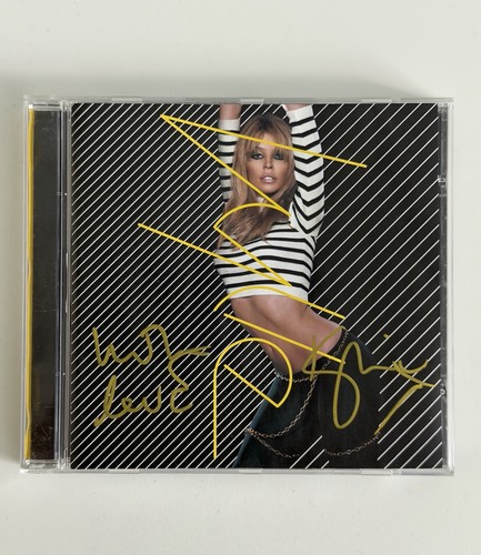 Signed with love kylie - love”,