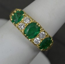Impressive 18ct Gold Emerald and Diamond Cluster Ring