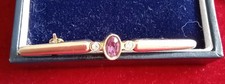 Vintage Jewellery Sphinx Gold Tone Purple and Clear Bar   Brooch