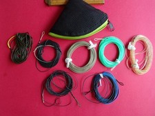 A USED SHOOTING HEAD CAST WALLET (UNBRANDED) + COLLECTION OF USED CASTING HEADS