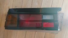 Nissan Datsun Sunny Coupe B11, LH rear combination lamp, new genuine part. 