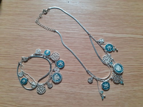 Avon tibetan charm bracelet - tibetan,