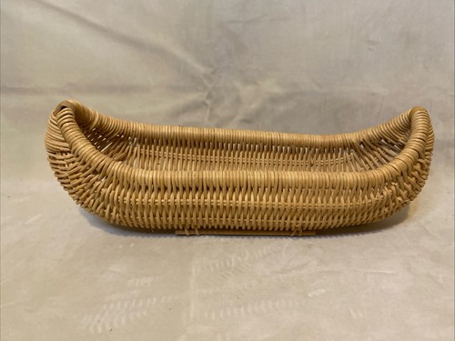 Hand woven wicker canoe - hand,