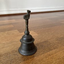 Bronze Bell with cow on top. 