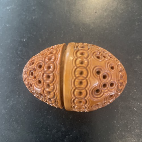 Antique egg shaped hand - , carved