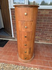 Round, six drawer drum chest made from sheesham wood.