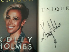 KELLY HOLMES DBE, SIGNED