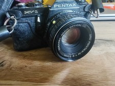 Pentax MV1 and 50mm f2 lens - 35mm film camera in good condition. 