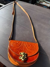 Kouros Embossed Leather