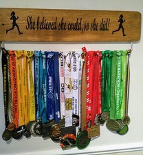 She believed medal display - believed,
