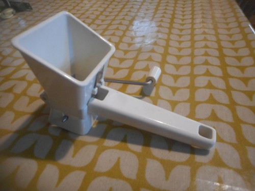 Old white plastic mouli type - old,