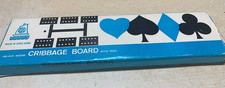 Inlaid wood cribbage board